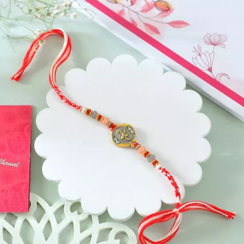 Traditional Rakhi with Ritual Gifts
