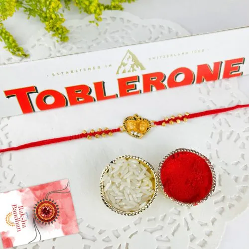 Spiritual Radhakrishna Rakhi & Toblerone Surprise Spiritual Radhakrishna Rakhi & Toblerone Surprise